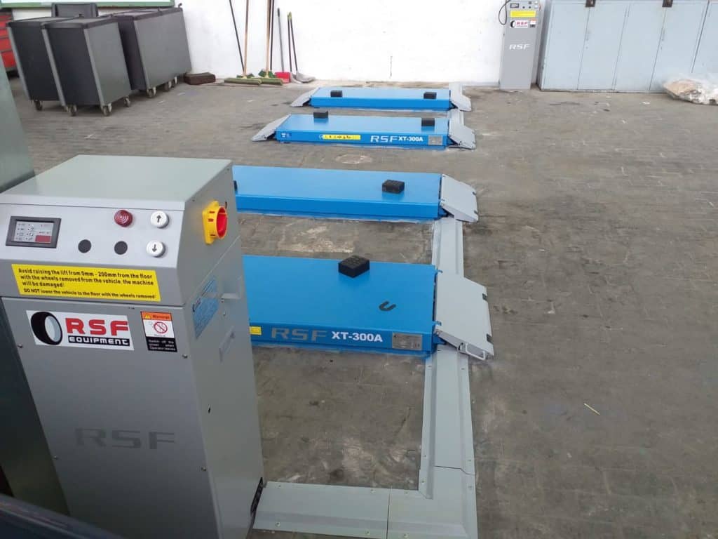 Tacos de goma para elevador de vehículos